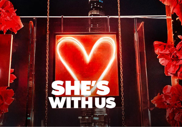 SHES-WITH-US